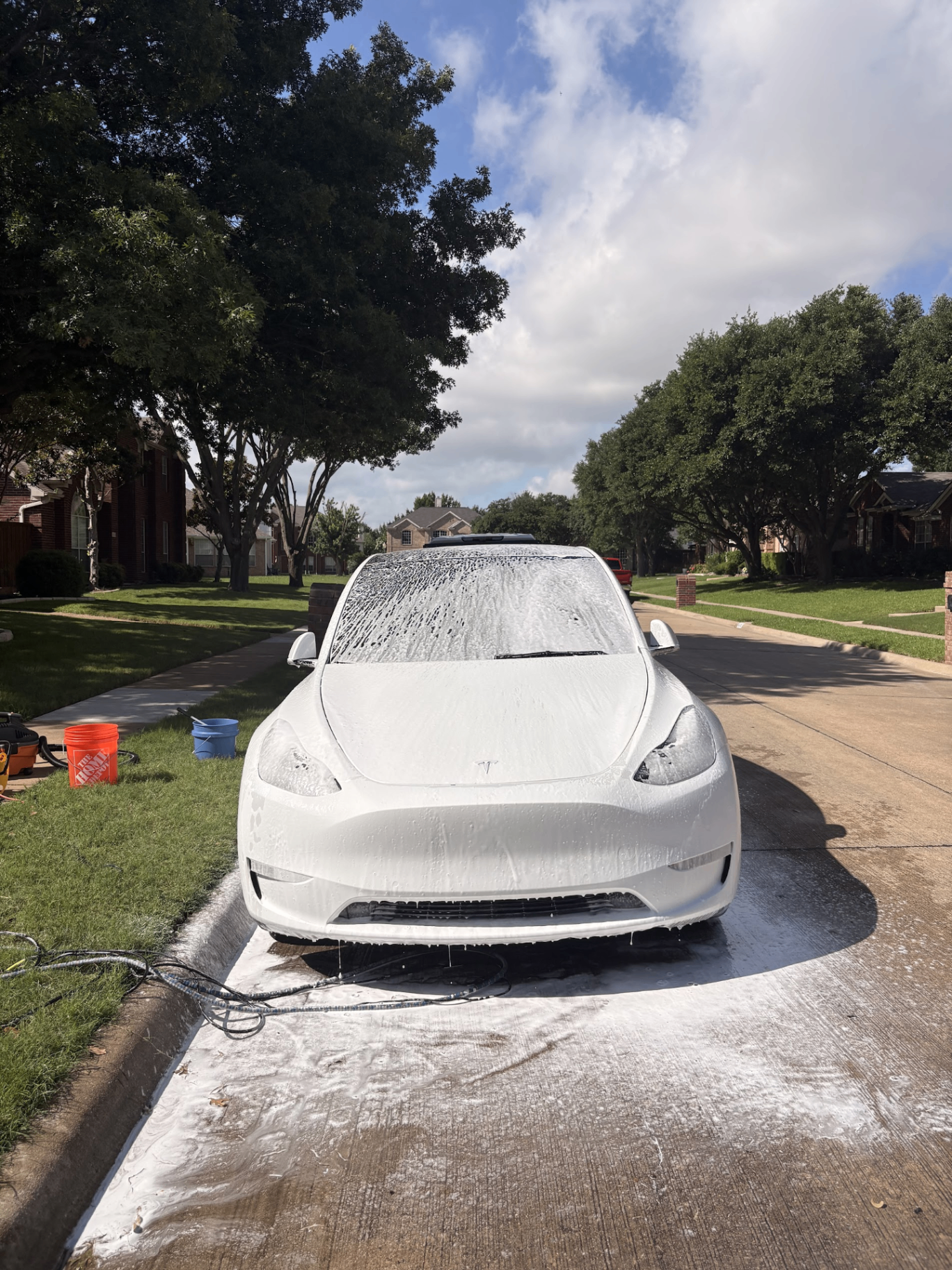 Tesla Model Y exterior foam wash mobile detailing in Frisco TX